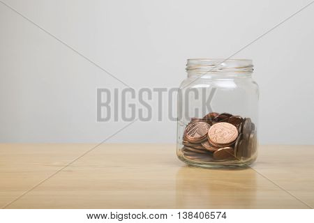 Low Value British Coins In A Jar