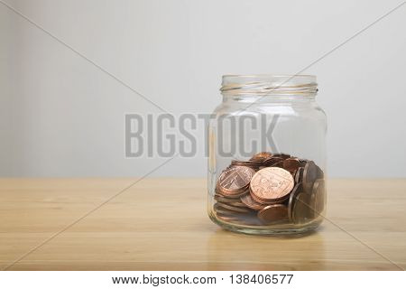 British Coins In A Glass Jar