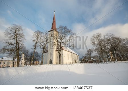 Winter landscape, chucrch in snow. Old building.
