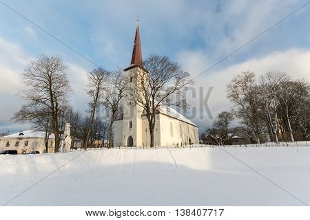 Winter landscape, chucrch in snow. Old building.