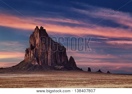 Shiprock, the great volcanic rock mountain in desert plane of New Mexico, USA