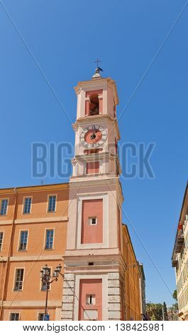 NICE FRANCE - APRIL 11 2016: Clock Tower (circa 1718) at Palais Square in Old Town of Nice France. Architect Bernardo Spinetta
