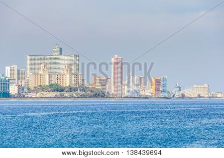 The skyline of the Vedado neighborhood with its skyscraper hotels on the shore in Havana the capital of Cuba