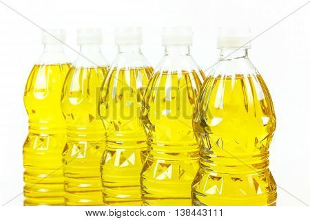 Five bottles oil of refined palm olein from pericarp