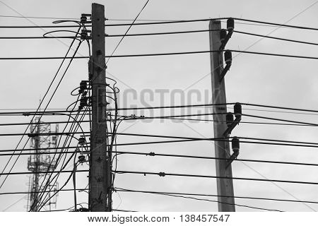 Wire assemblage a lot of cables and wires on pole in the city