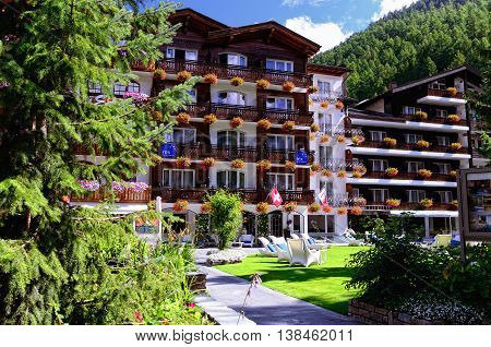 ZERMATT, SWITZERLAND - AUGUST 31, 2014: 4 Star Hotel Rex on August 31, 2014 in Zermatt, Switzerland. Zermatt is a Mountain Resort Town in Southern Switzerland.