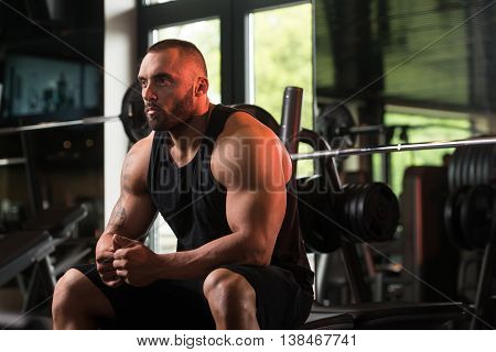 Muscular Man Resting On The Bench
