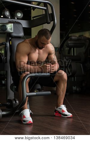 Muscular Man Resting On The Bench