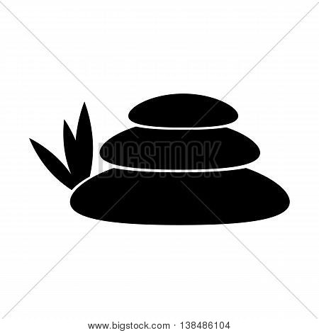Spa icon. Massage stones with leaves. Silhouette vector illustration
