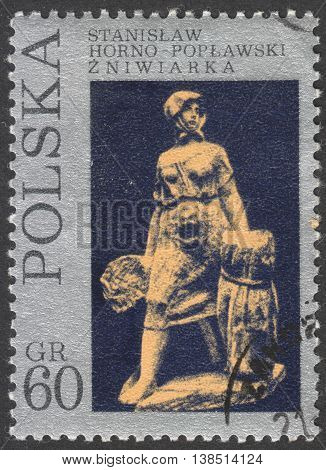 MOSCOW RUSSIA - CIRCA FEBRUARY 2016: post stamp printed in POLAND showsa sculpture 