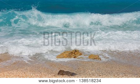 Tropical beach view, Greece, Lefkada. Detail of breaking waves on beach, Lefkada, Greece