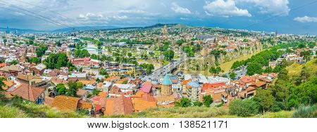 The banks of Tbilisi are on the palm if watch from the top of Sololaki Hill Georgia.