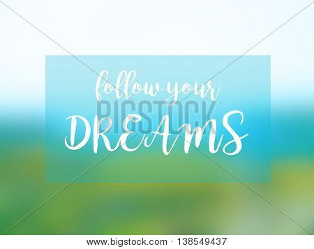Follow your dreams inspirational quote card with blurred background