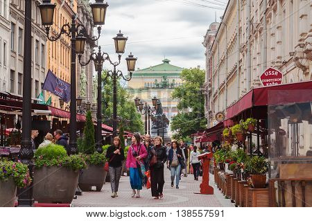 SAINT PETERSBURG, RUSSIA -JULY 09, 2016: Tourists walk on pedestrian street in the center of St. Petersburg on Malaya Sadovaya, many street cafes
