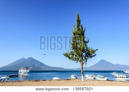 Boats & volcanoes: Atitlan Toliman & San Pedro at Lake Atitlan Guatemala, Central America