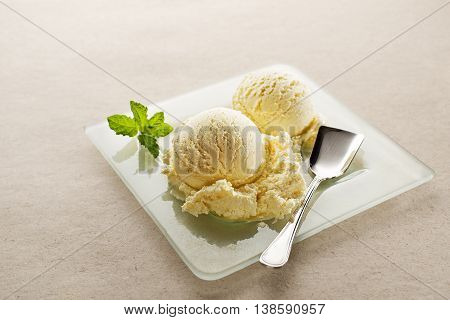 Fresh fruit sorbet ice cream in a white bowl close up