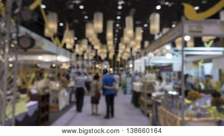 People Shopping In Exhibiton Trade Fair - Blur