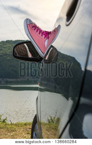 Legs Out Of The Car Window By The Lake