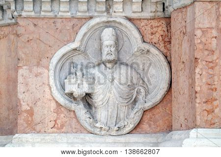 BOLOGNA, ITALY - JUNE 04: Saint Petronio by Giovanni di Riguzzo relief on facade of the San Petronio Basilica in Bologna, Italy, on June 04, 2015
