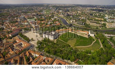 AERIAL. Beautiful sunny day aerial panorama shot of old town in capital of Lithuania Vilnius