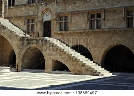 stone staircase in the courtyard of an ancient castle in Rhodes
