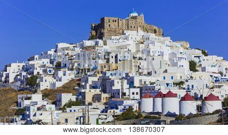 beautiful Astypalea island - view of old castle and Chora with a windmills