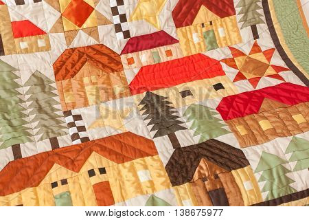 Patchwork quilt. Part of patchwork quilt as background. Flower print. Color blanket in style patchwork. Color blanket. Handmade.