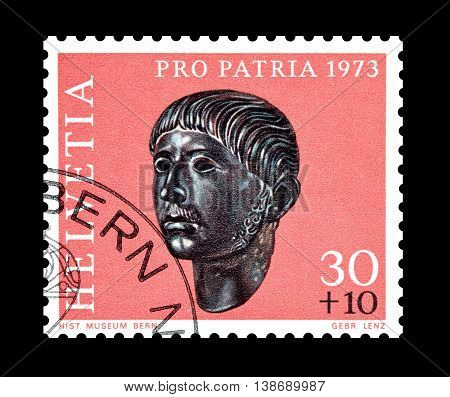 SWITZERLAND - CIRCA 1973 : Cancelled postage stamp printed by Switzerland, that shows Gallic head.