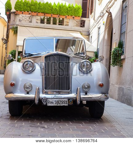 COMO, ITALY - JUNE, 12:  View of ancient Vanden Plas Princess limousine parked in the street on June 12, 2016