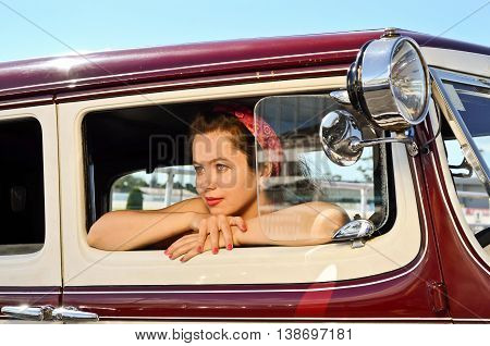 Young lady at vintage car and fashion show in Auckland, New Zealand
