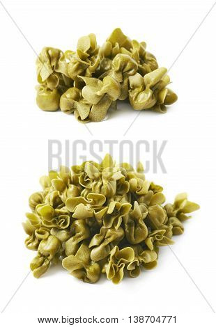 Pile of sacchettoni stuffed sacchetti pasta isolated over the white background, set of two different foreshortenings