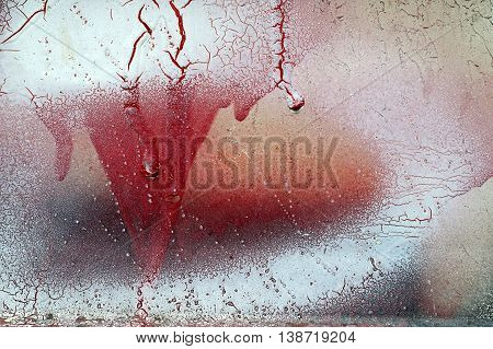 Cracked And Dripping Red And White Paint On Grunge Metal