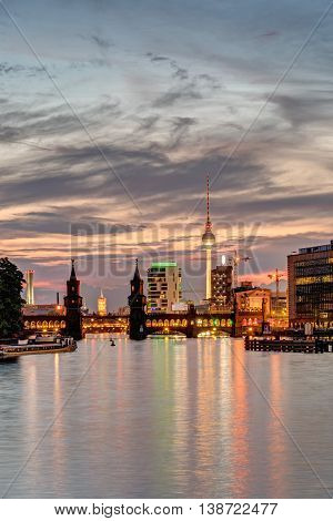 Dawn at the river Spree in Berlin with the Television Tower in the back