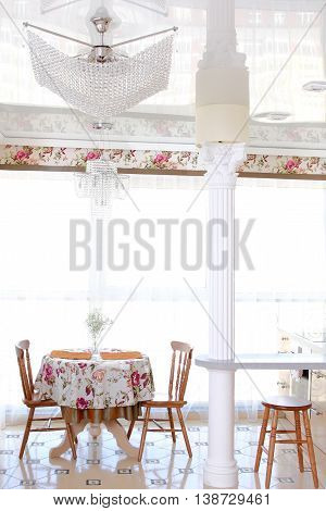 Interior Of Modern Kitchen, View Of A Window And Bar Rack With Kolnny, A Horizontal Shot
