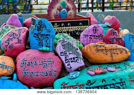 Religious prayer stones with prayers in Datsan Rinpoche Bagsha on Bald Mountain in Ulan-Ude, Buryatia, Russia.