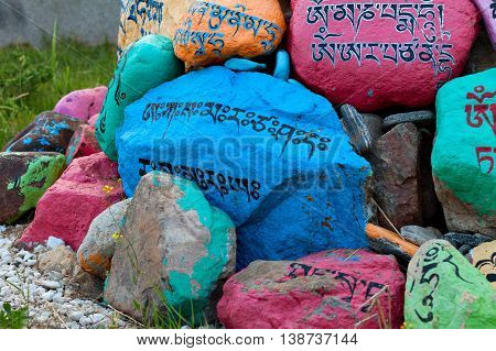 Religious prayer stones with prayers in Datsan Rinpoche Bagsha on Bald Mountain in Ulan-Ude, Buryatia, Russia.