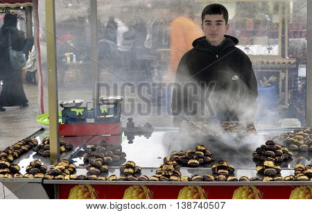 Istanbul Turkey - December 12 2012: Indispensable to Istanbul roasted chestnuts. Every season there in the streets.
