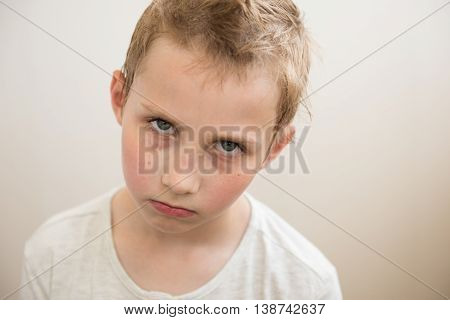 Portrait of sad boy with expressive eyes