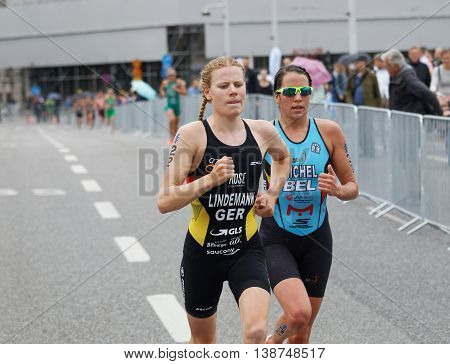 STOCKHOLM - JUL 02 2016: TCloseup of triathlete Laura Lindemann running in the Women's ITU World Triathlon series event July 02 2016 in Stockholm Sweden