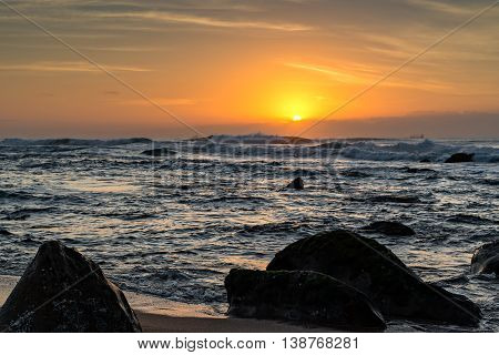 View of ships on the Indian Ocean from Umhlanga Rocks Beach at Sunrise