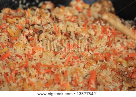 closeup traditional food hand pilaf in xinjiangchina