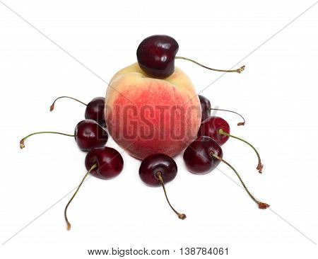 peach with a sweet cherry. artistic composition on a white background. isolated Photo