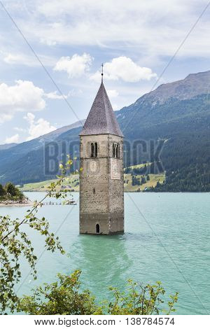Bell Tower In Lake Reschen, Italy