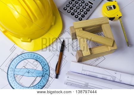 An Office Desk With The Project Papers