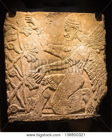 ROME, ITALY - APRIL 8, 2016: Assyrian mythical deity Shedu. Relief from Palace of Assurbanipal in Nineveh, Assyria