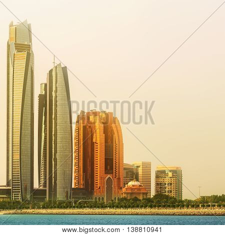 View of Abu Dhabi Skyline and Al Bateen marina at sunset, United Arab Emirates