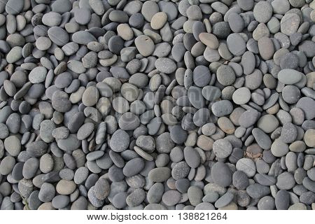grey river rocks in a stone bed