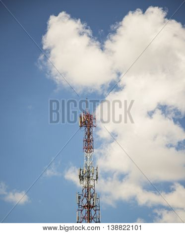 Tele-radio tower on blue sky background, Thailand