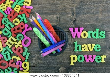 Words have power word on wooden table
