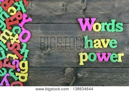 Words have power word on wooden table